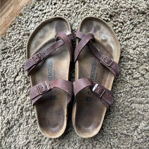 Birkenstocks. Size 40, brown, some wear.